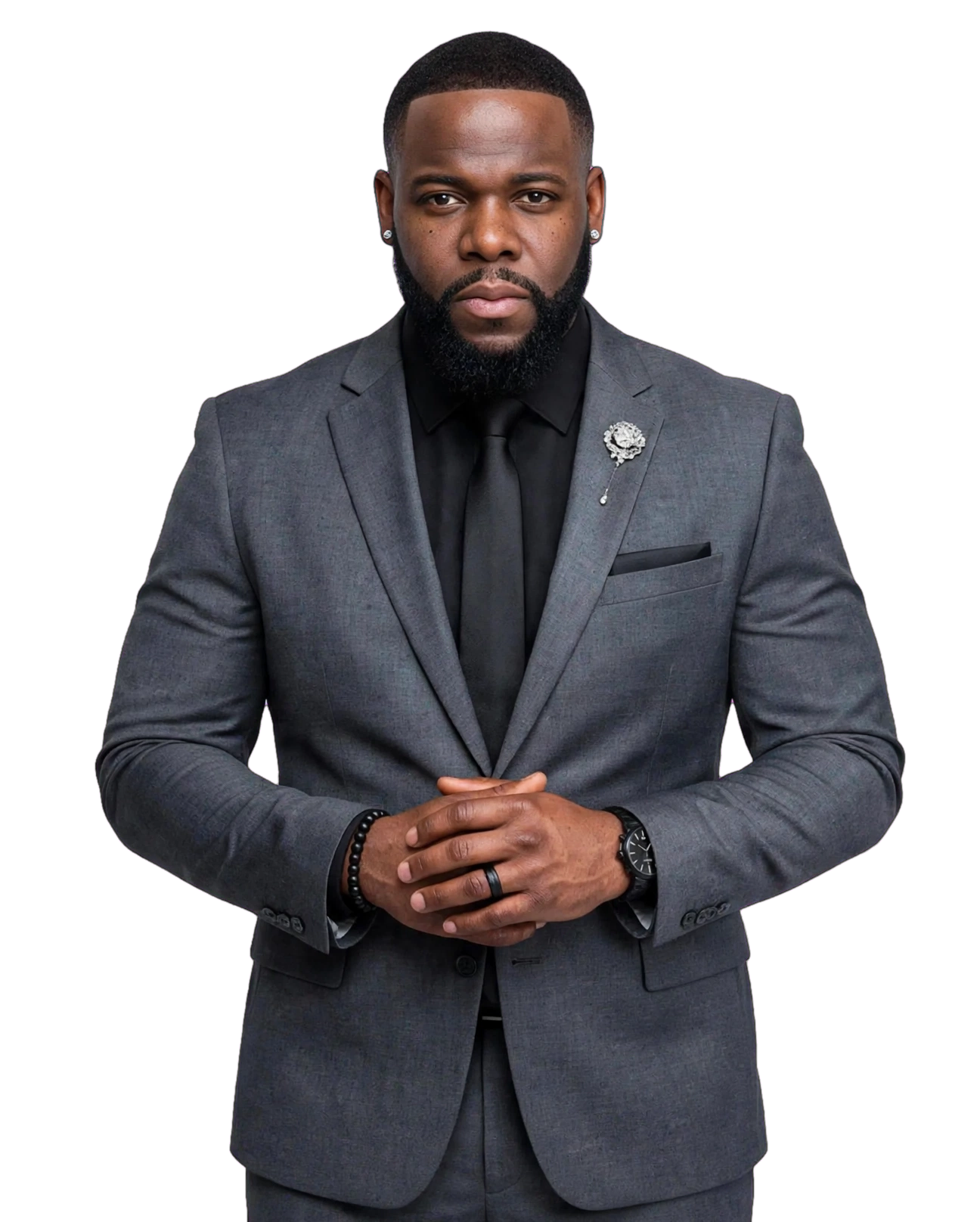 Donnie Burton in his approved charcoal suit, black shirt and tie